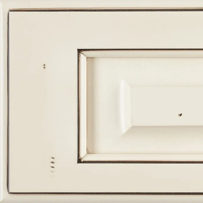 Cream painted door with a distressed, glazed finish