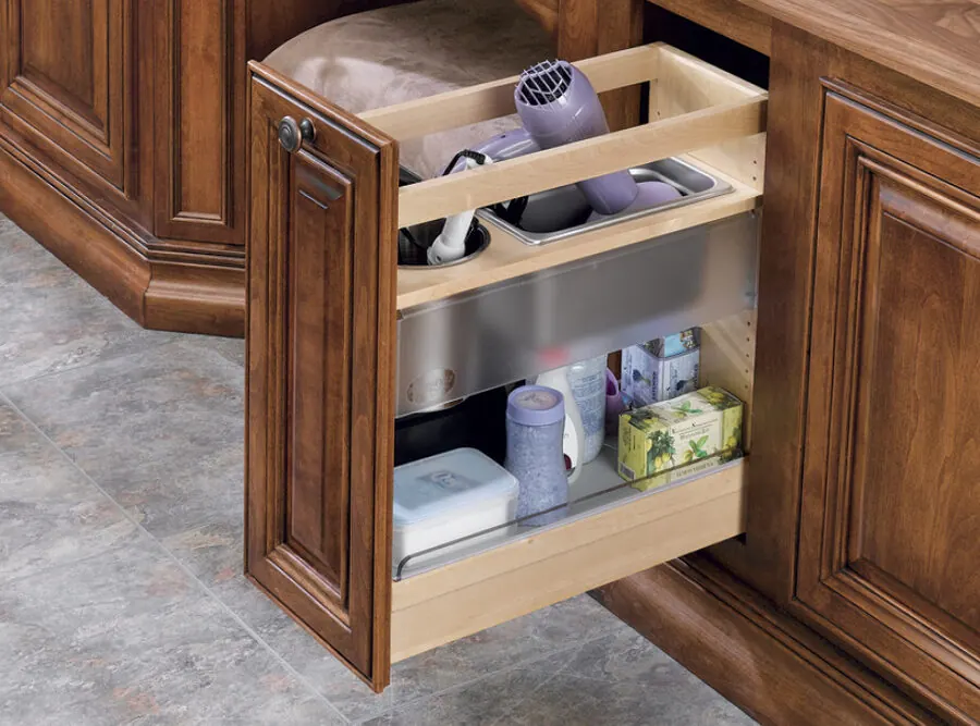 Vanity pullout holding a hair dryer and grooming tools
